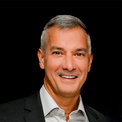 Image of A headshot photo of Sylvain Chiasson, smiling