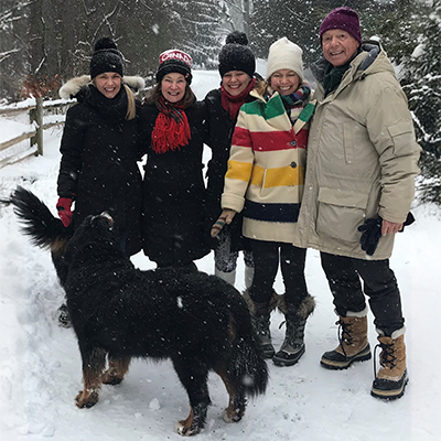 The Bell family outside during winter