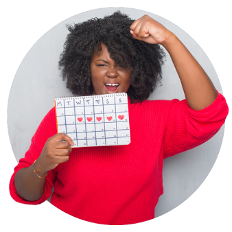 Woman holding a calendar for her fundraising challeng