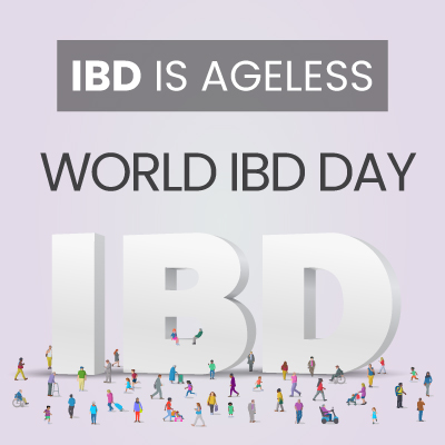 People standing around Giant words spelling out IBD
